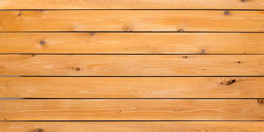 Cedar wood background of staggered boards