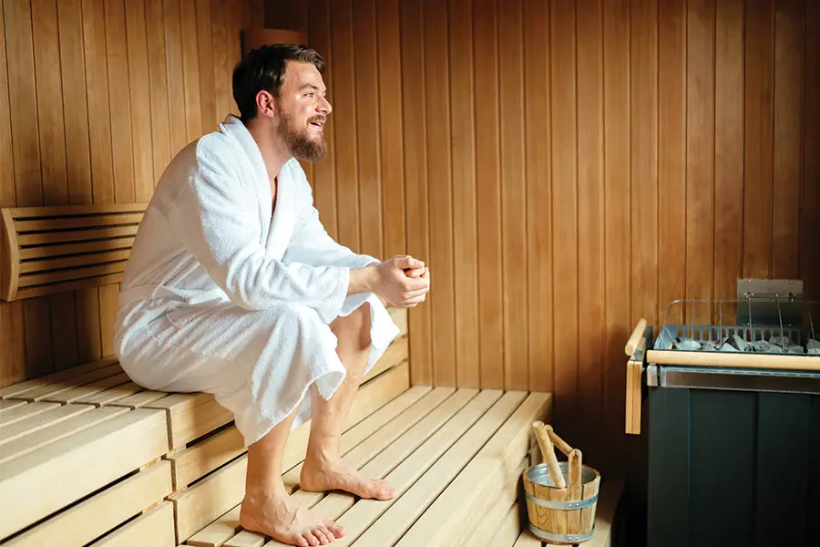 Man relaxing in a sauna