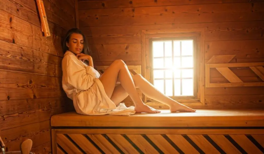 Pretty woman in sauna