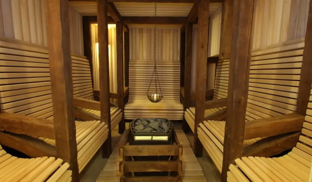 Sauna room with traditional sauna accessories